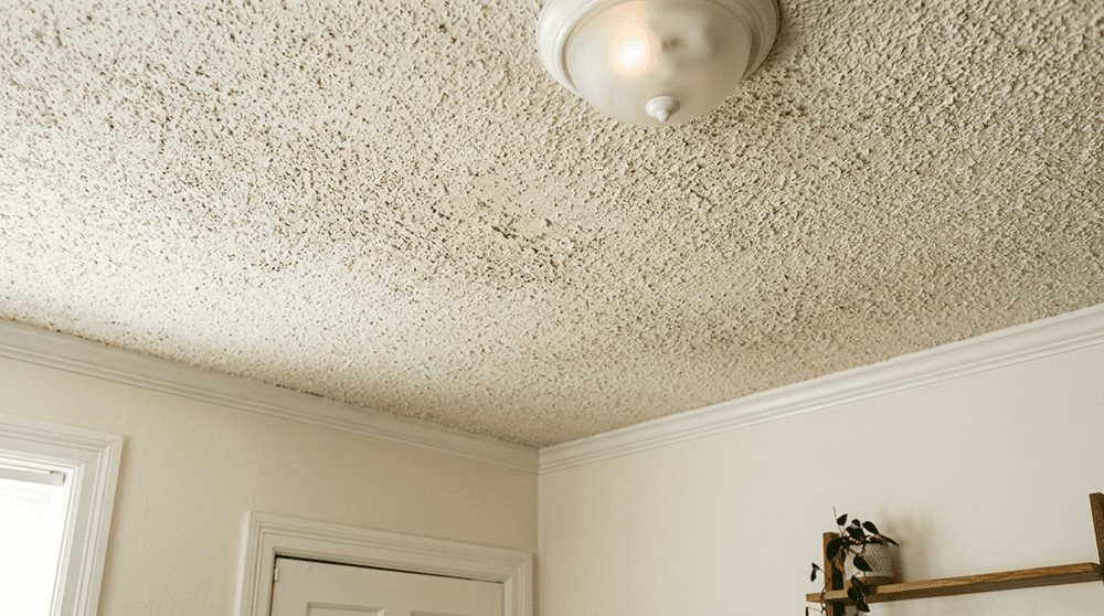 Bedroom ceiling before popcorn removal