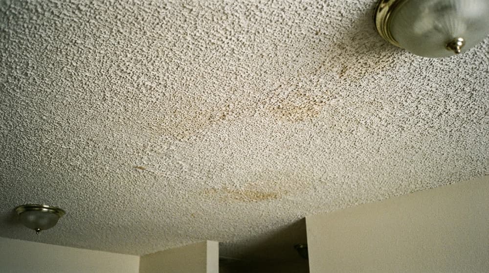 Bedroom ceiling before popcorn removal
